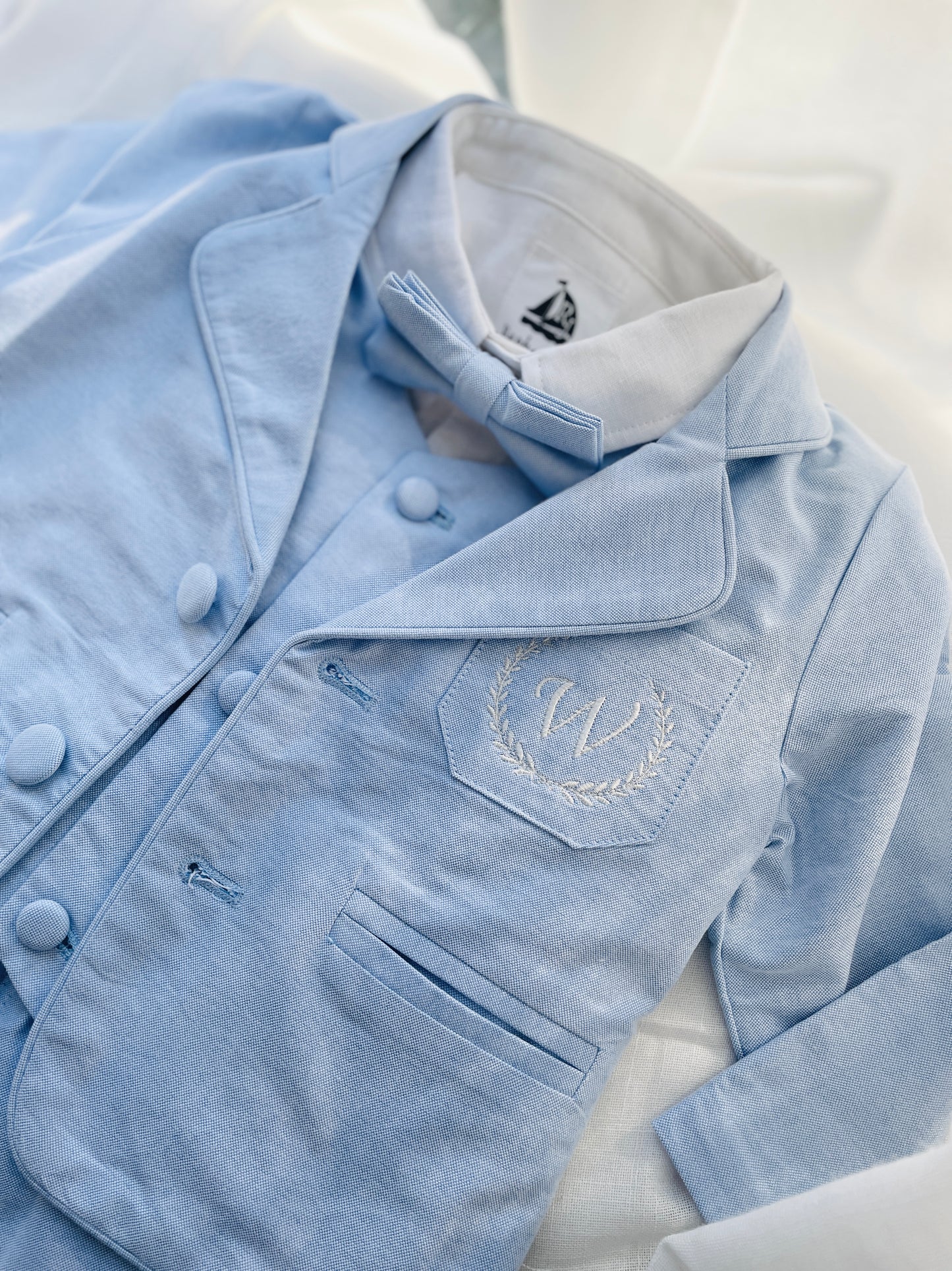 Baby and Toddler Boys pale blue chambray set with vest, pants, linen shirt, bowtie and suspenders, plus optional jacket cap and shoes