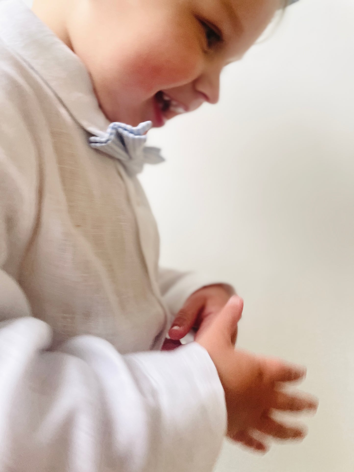 Blue chambray set with blue pants, white linen shirt, white suspenders and blue bowtie