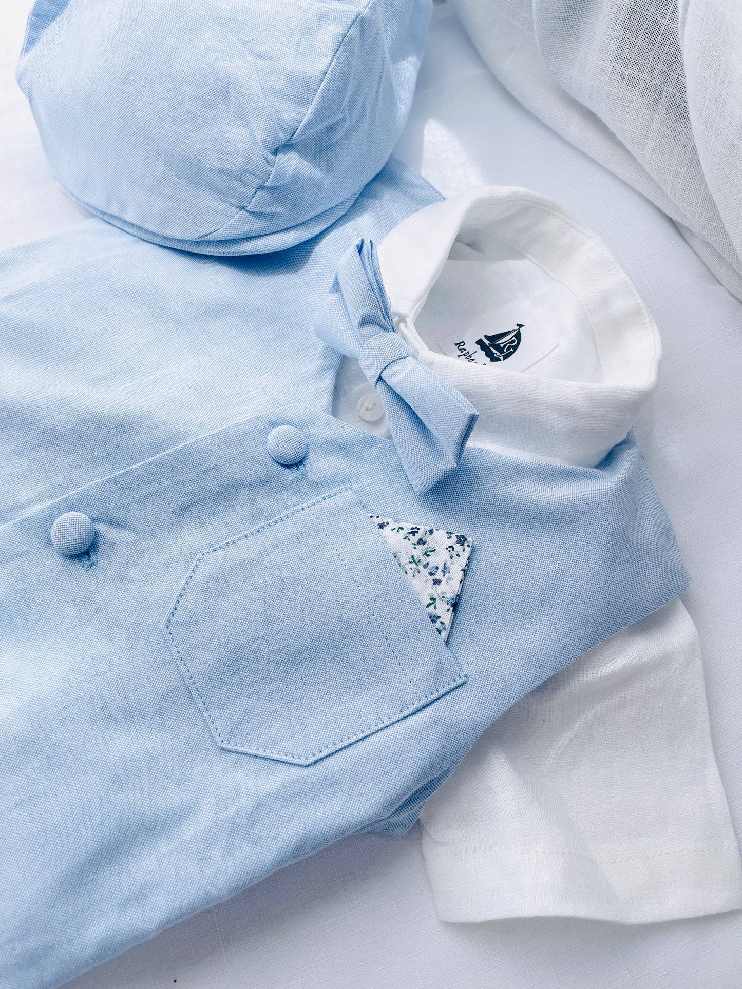 Baby and Toddler Boys pale blue chambray set with vest, pants, linen shirt, bowtie and suspenders, plus optional jacket cap and shoes