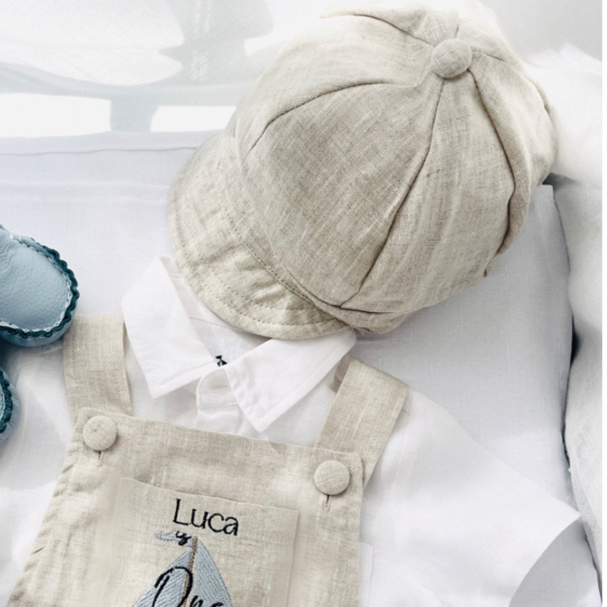 Beige linen paper boy cap for baptisms and christenings with optional embroidery