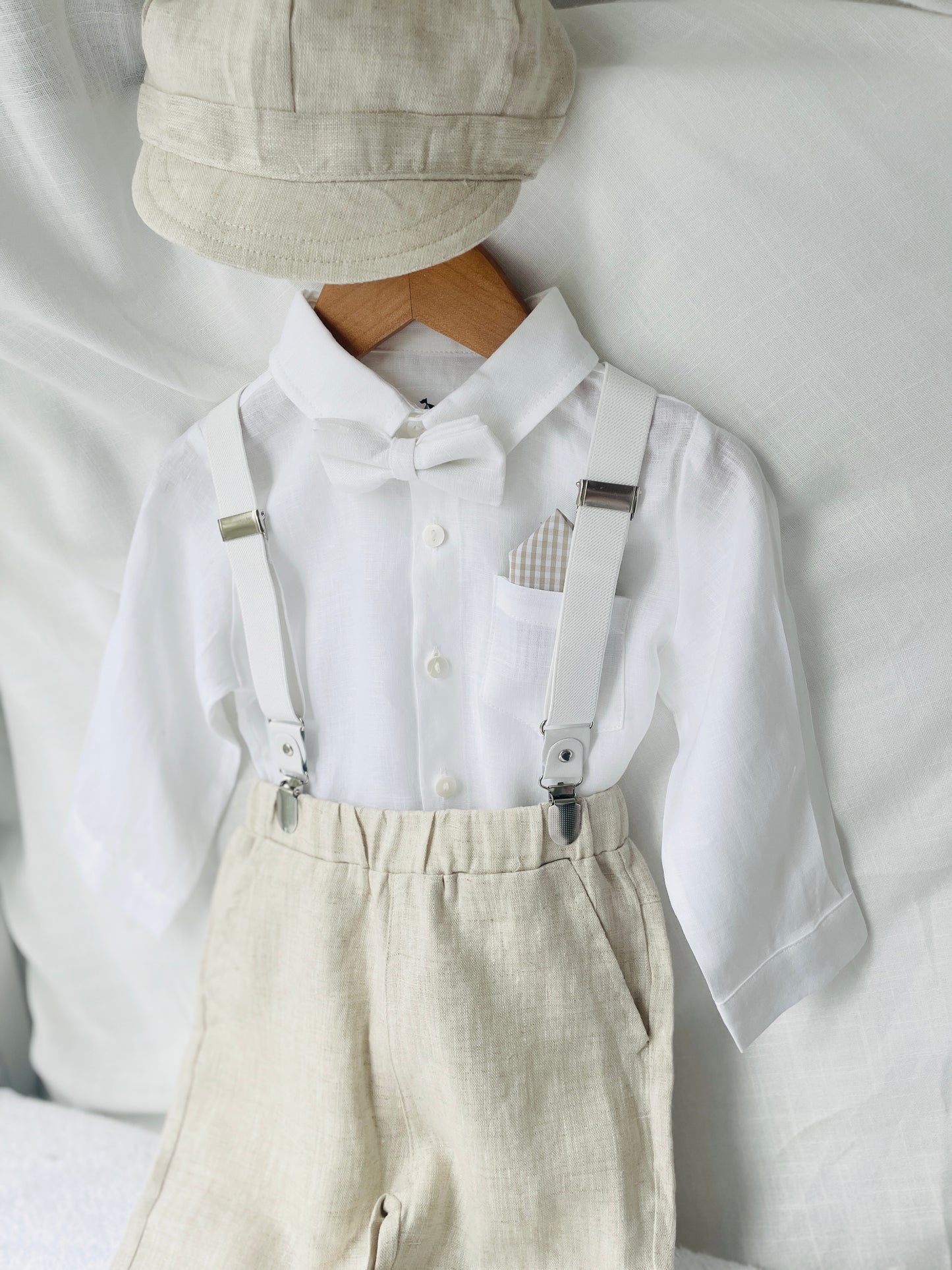 Beige linen suit with optional jacket, cap and shoes.