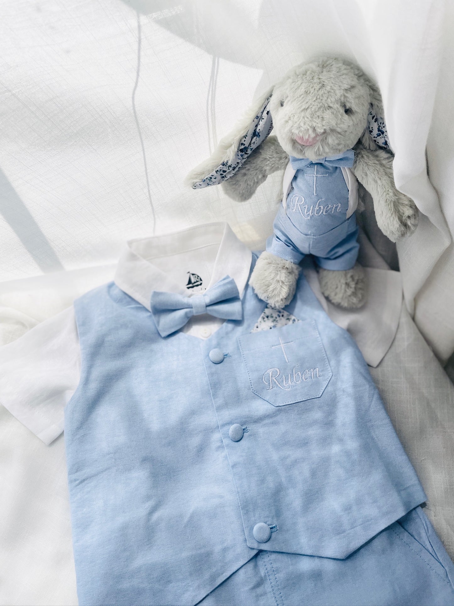 Baby and Toddler Boys pale blue chambray set with vest, pants, linen shirt, bowtie and suspenders, plus optional jacket cap and shoes
