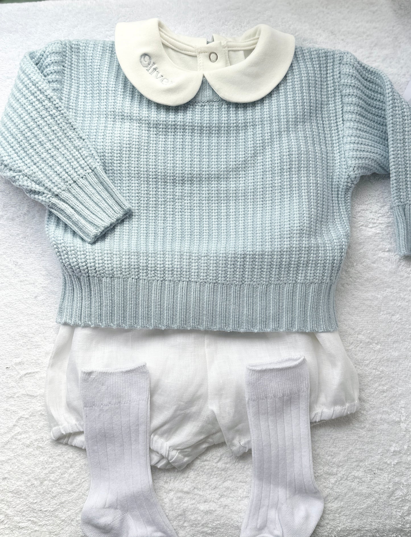Baptism outfit with blue jumper, off white onesie and white linen bloomers and long socks
