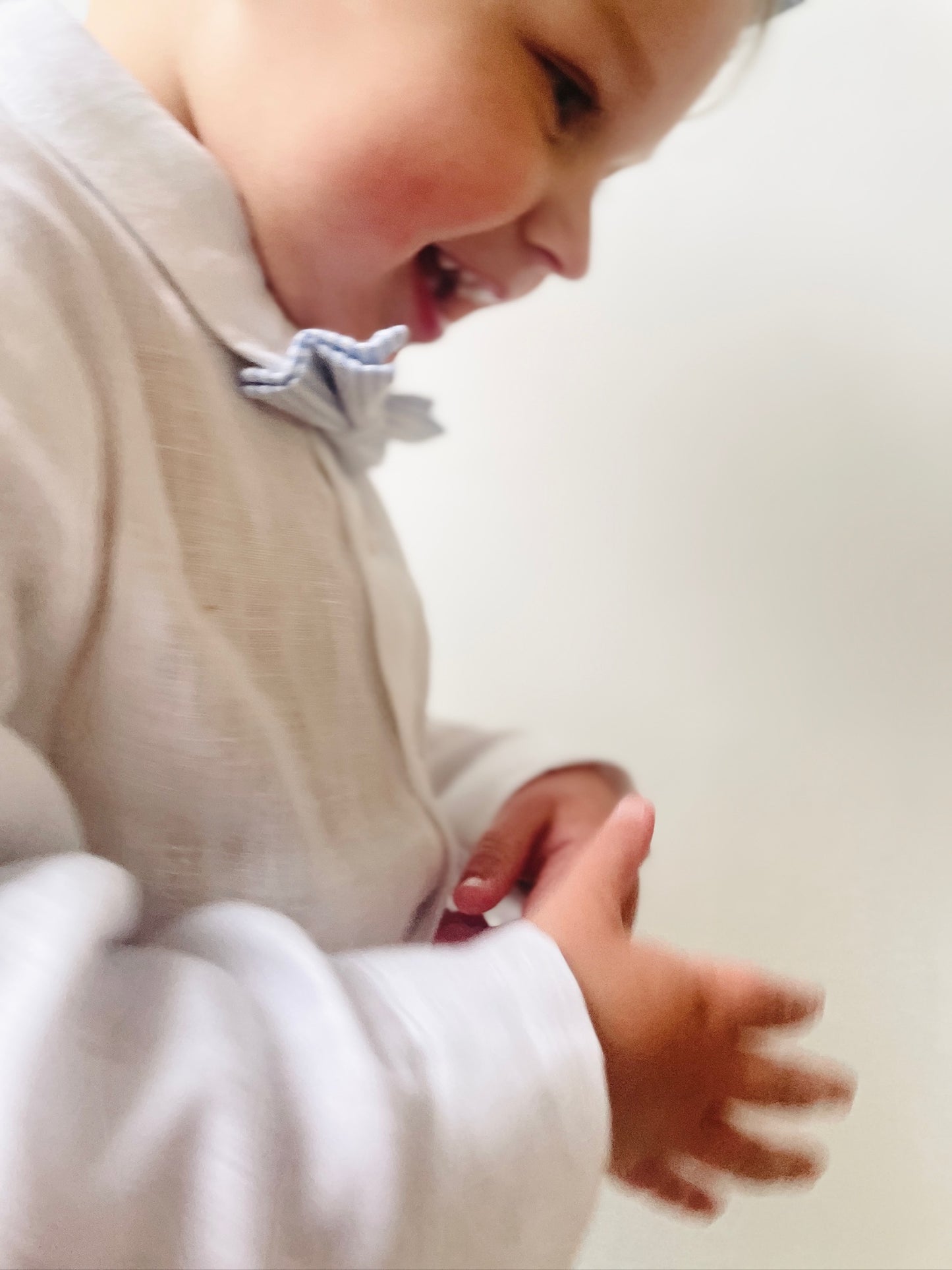 Beige linen suit with optional jacket, cap and shoes.