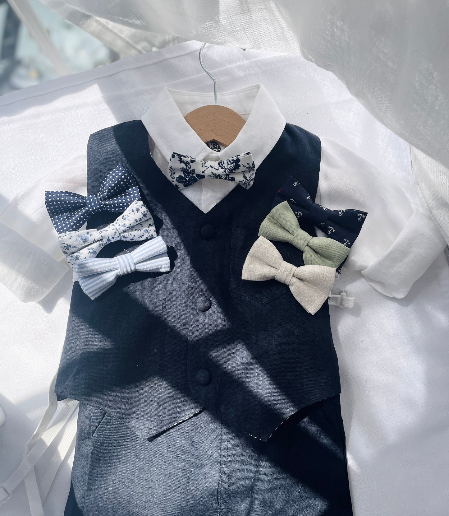 Navy blue linen summer set with vest, shorts, shirt, suspenders and bow tie plus optional jacket, embroidery, shoes and cap