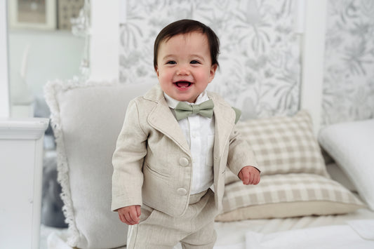 Beige linen suit with optional jacket, cap and shoes.