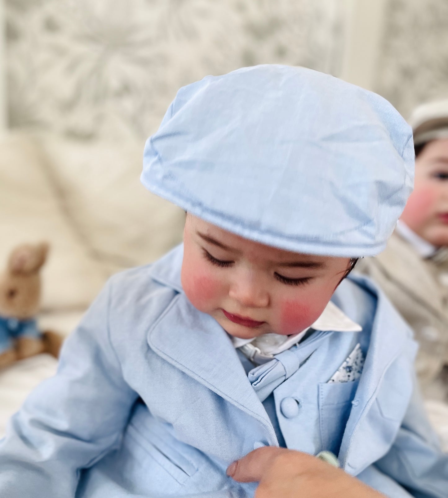 Light blue and white suit set with blue vest, bow tie and jacket, white linen pants, suspenders and shirt