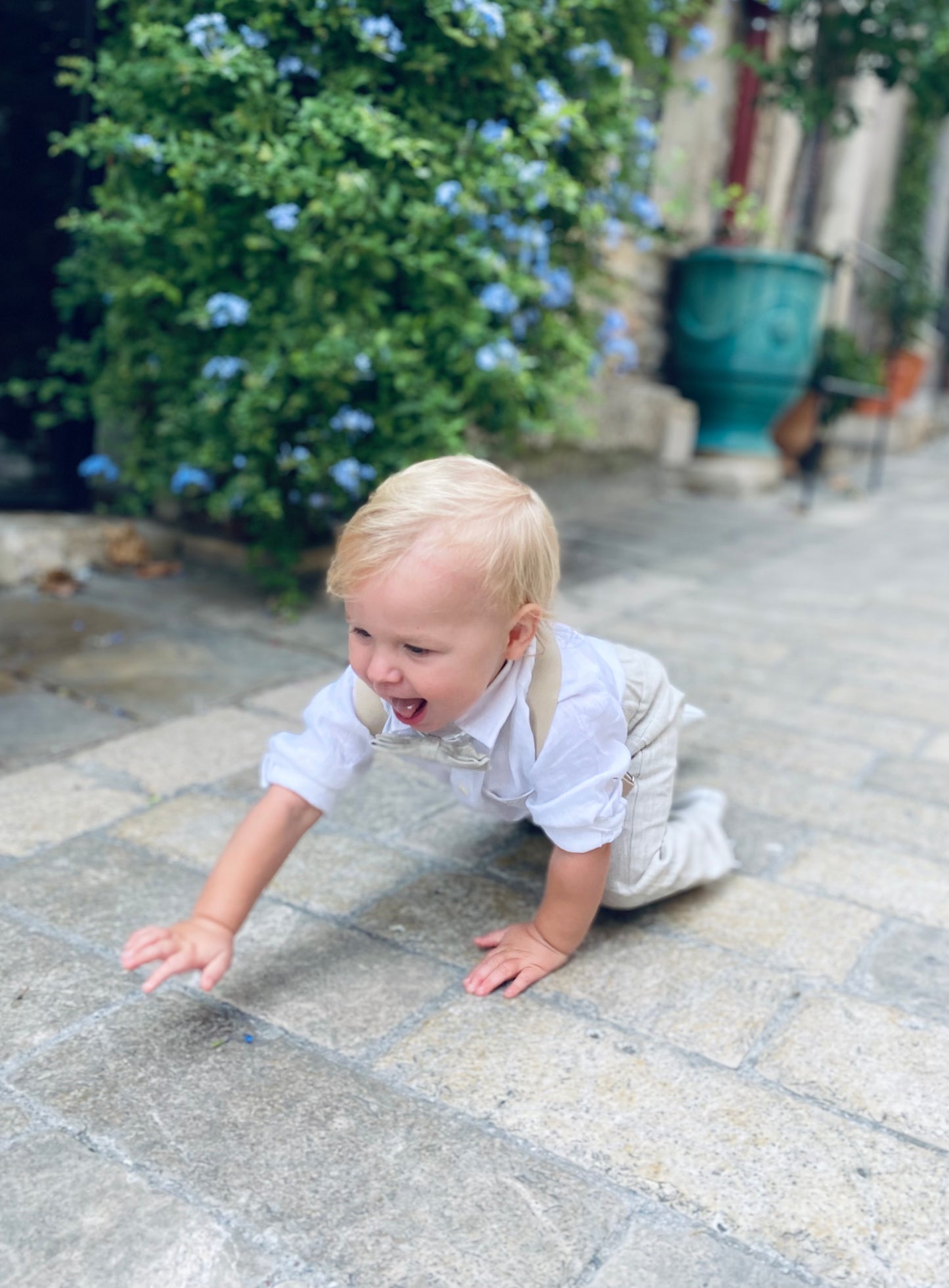 Beige linen suit with optional jacket, cap and shoes.