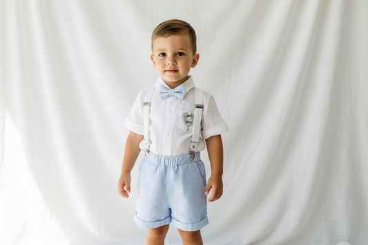 Blue chambray summer first birthday set with shorts, shirt, suspenders and bow tie plus optional extras
