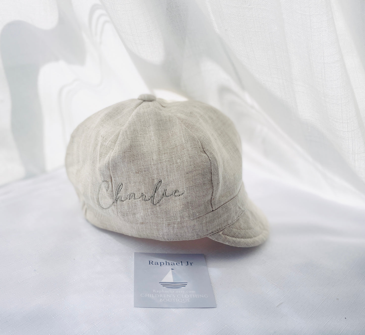 Beige linen paper boy cap for baptisms and christenings with optional embroidery