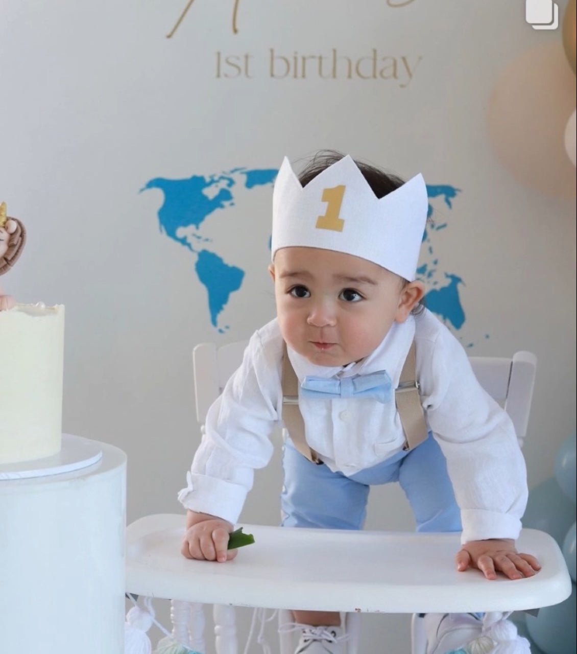 Blue chambray set with blue pants, white linen shirt, white suspenders and blue bowtie
