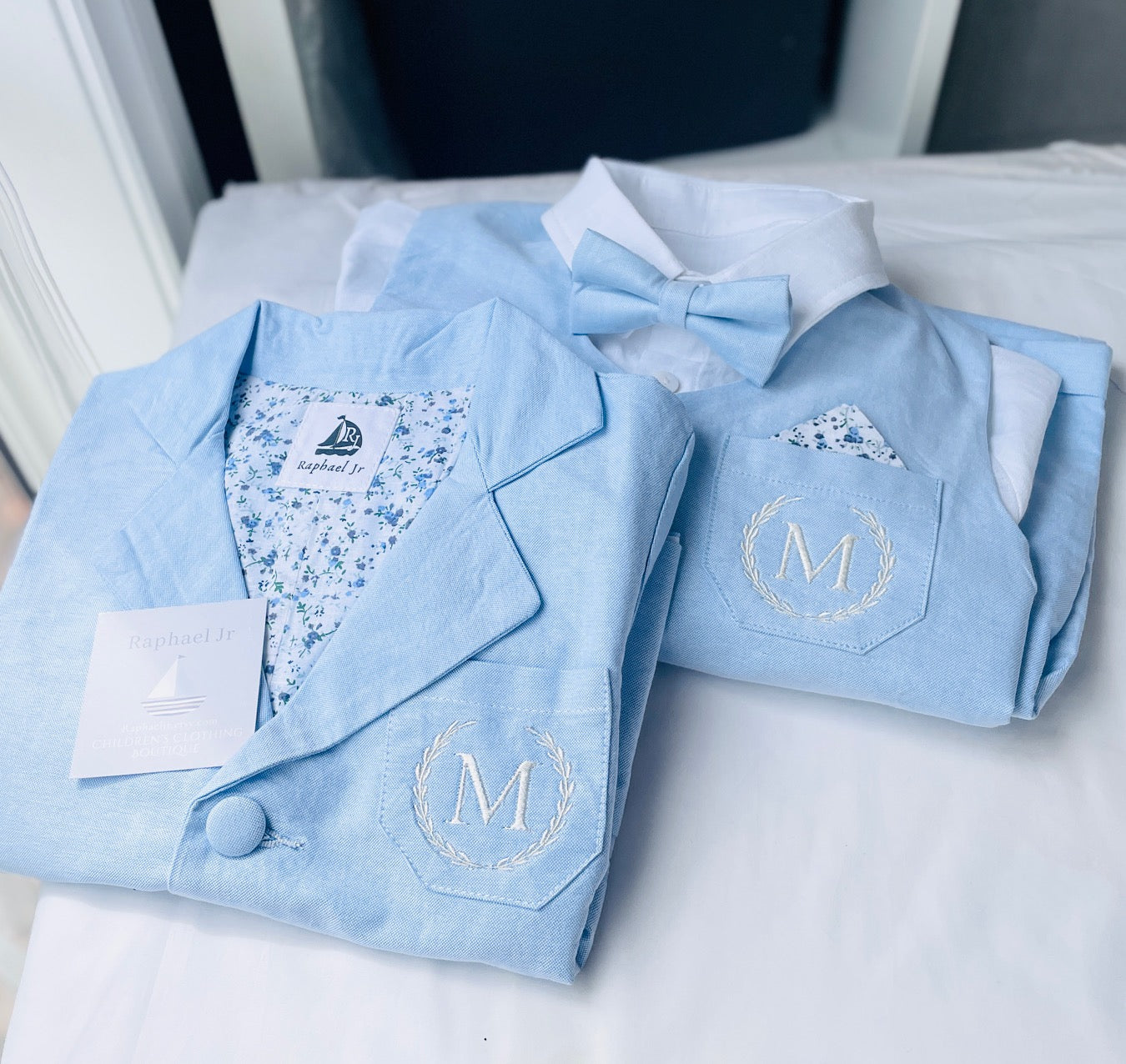 pale blue chambray summer first birthday set with shorts, shirt, suspenders and bow tie plus optional extras