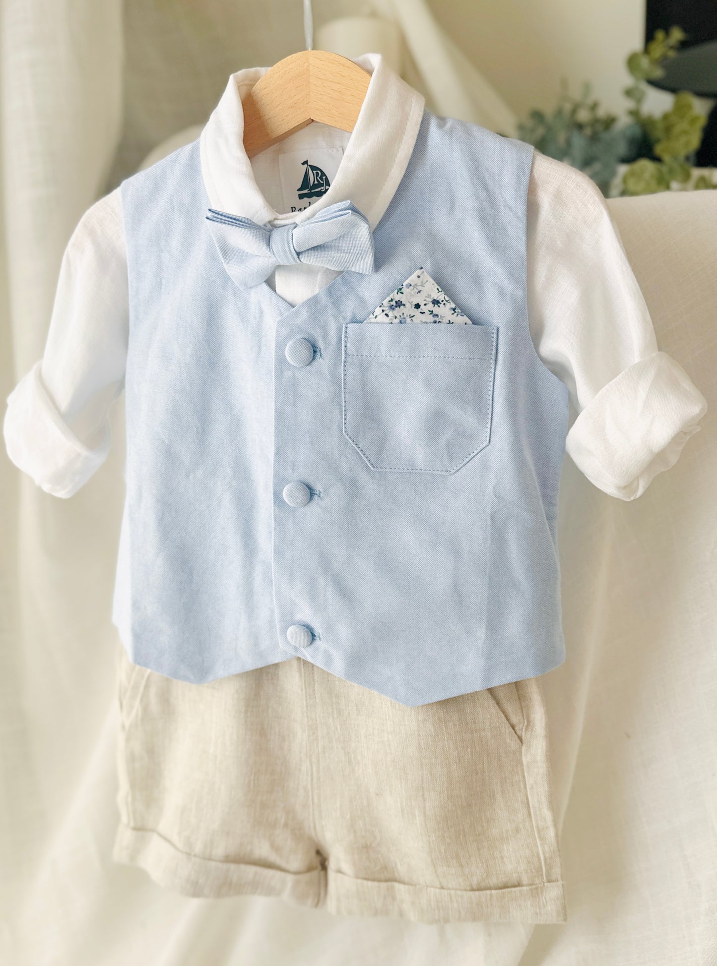 Pale blue and Beige linen summer set with blue vest, white shirt, beige shorts, suspenders and blue bow tie