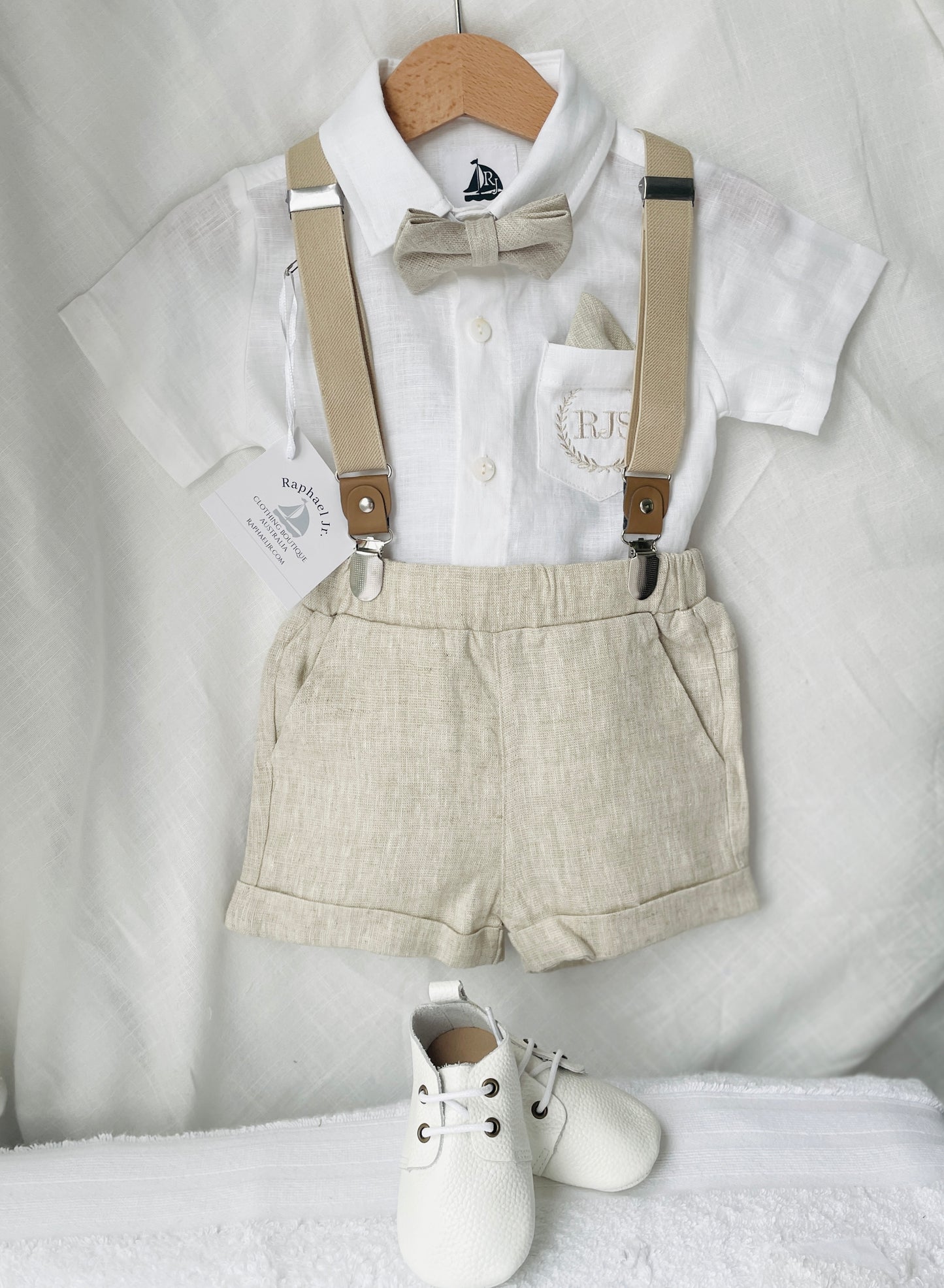 Beige Linen Baptism outfit with suspender shorts, shirt, and bow tie plus optional jacket and embroidery