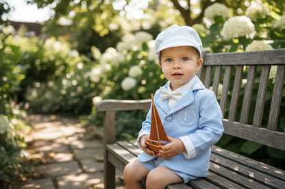 Pale blue summer vest set with blue vest, suspender shorts white shirt and bowtie