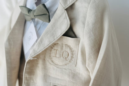 White and beige Summer linen outfit with suspender shorts, shirt, and bow tie plus optional jacket and embroidery