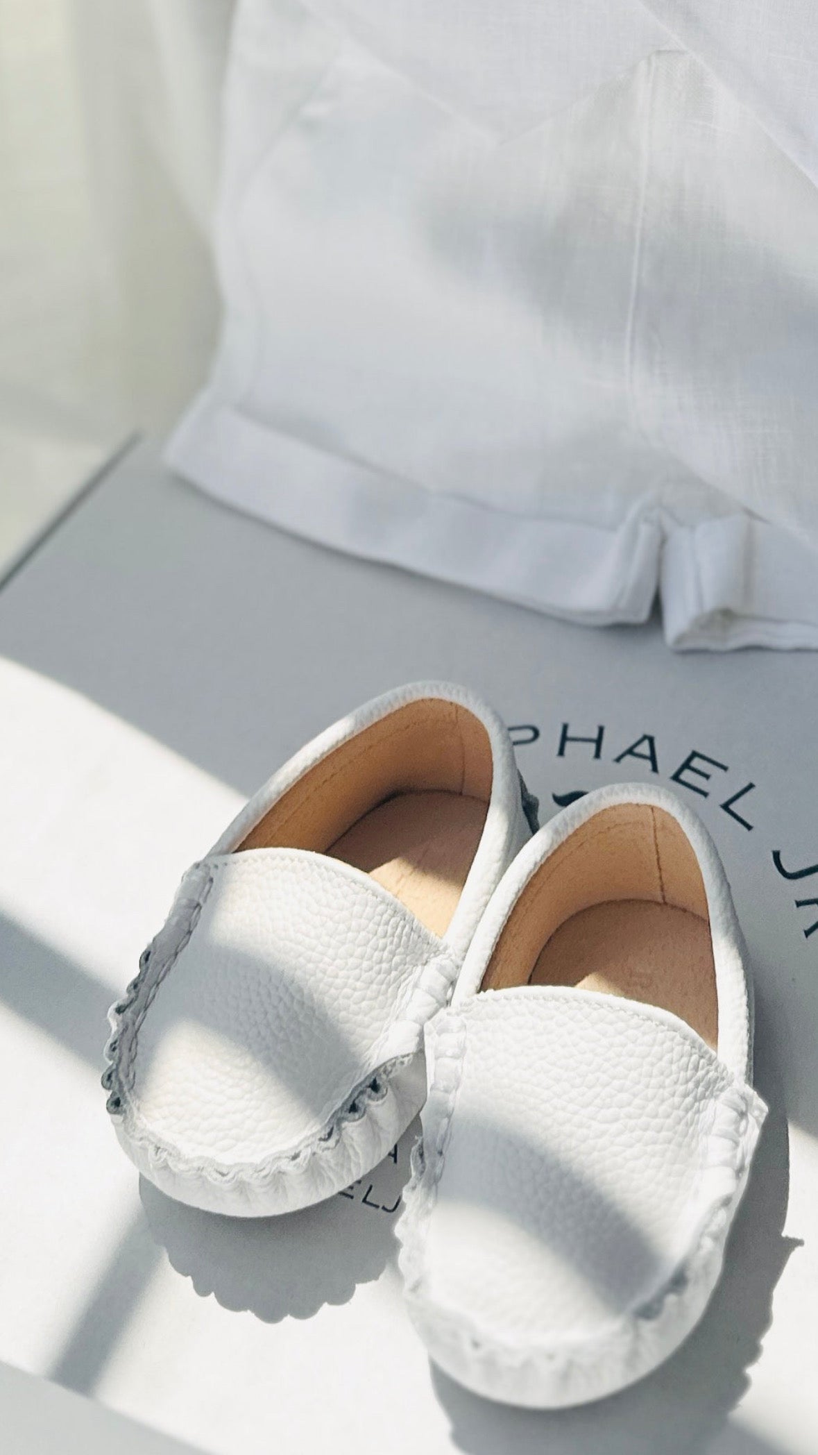 Beige Linen pants and blue vest outfit