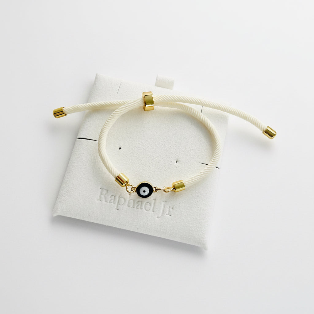 Evil eye bracelet white rope with gold clasps and optional charm
