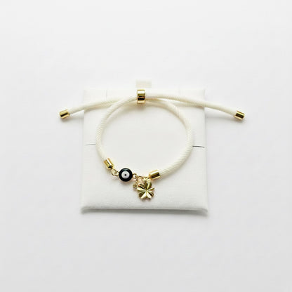 Evil eye bracelet white rope with gold clasps and optional charm
