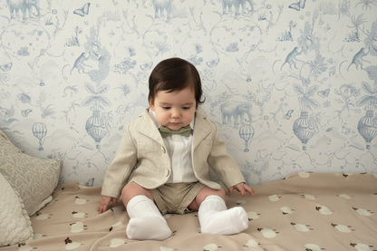 Beige Linen outfit with suspender shorts, shirt, and bow tie plus optional jacket and embroidery