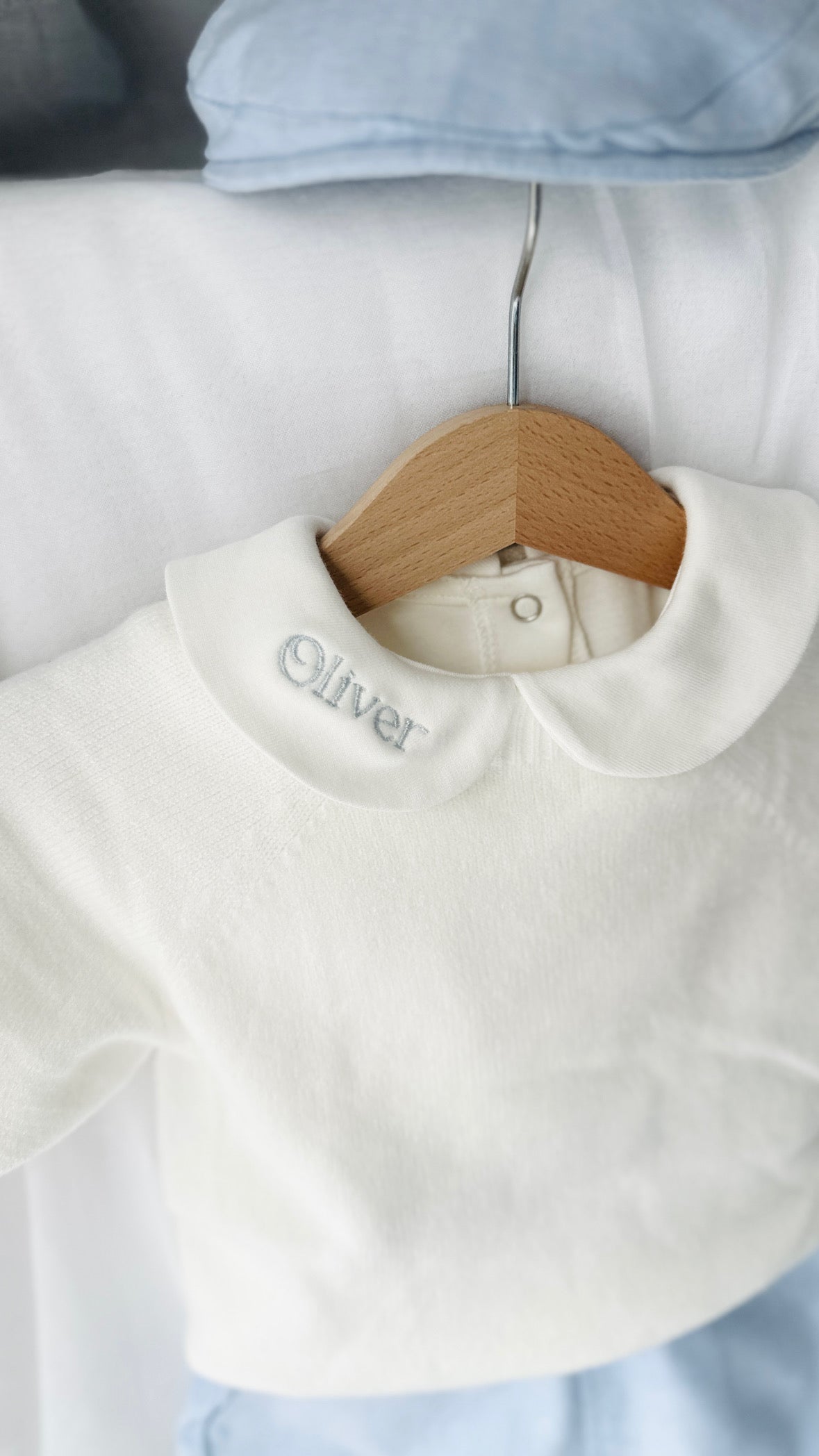 Baptism outfit with cotton onesie and cardigan or jumper and beige linen bloomers and white socks