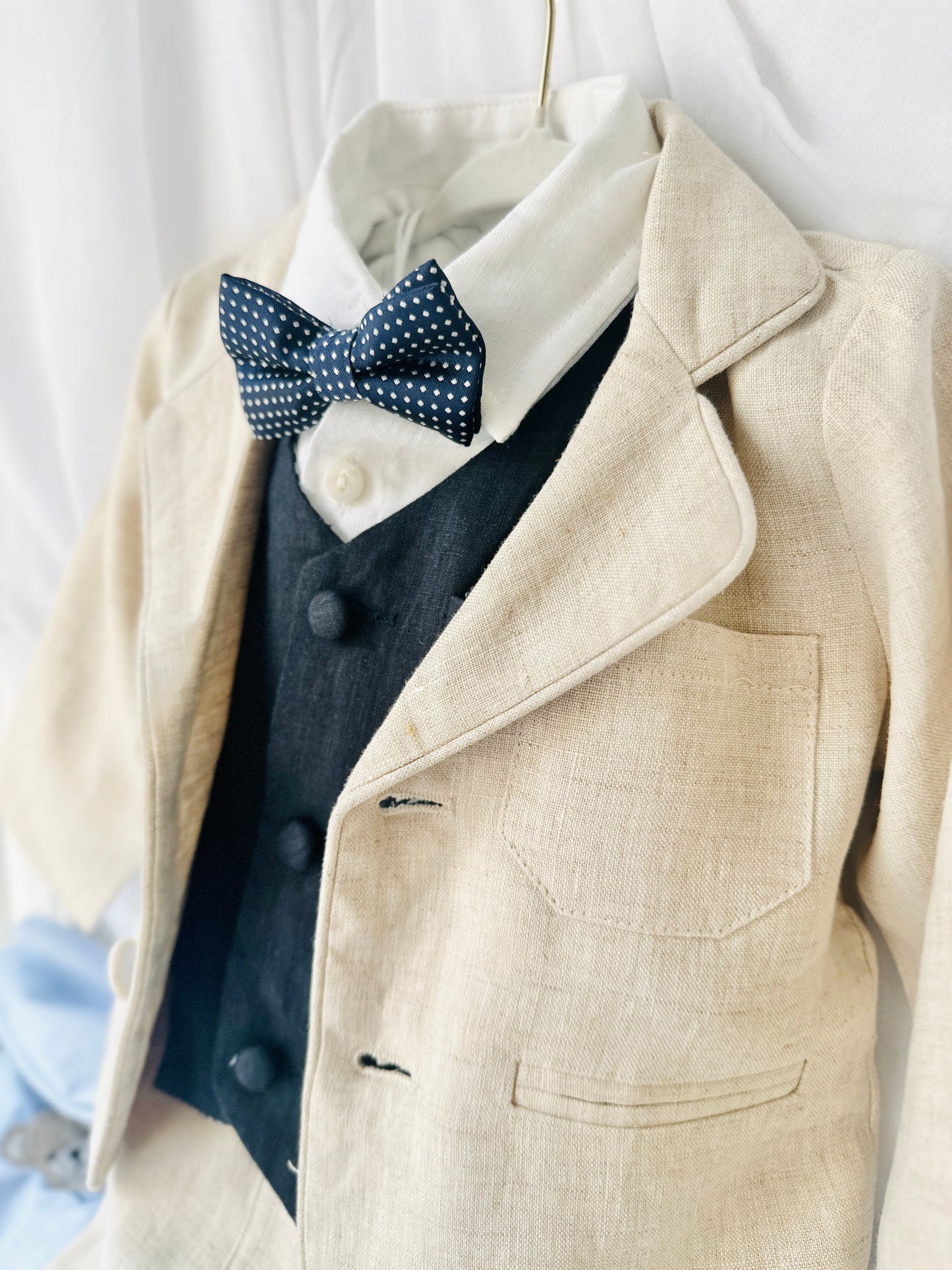 Beige linen suit with Navy blue vest
