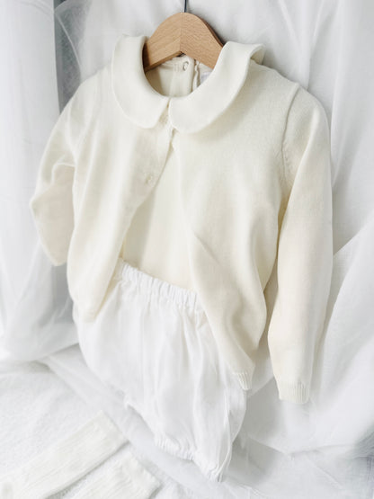 Baptism outfit with cotton onesie and cardigan or jumper and beige linen bloomers and white socks