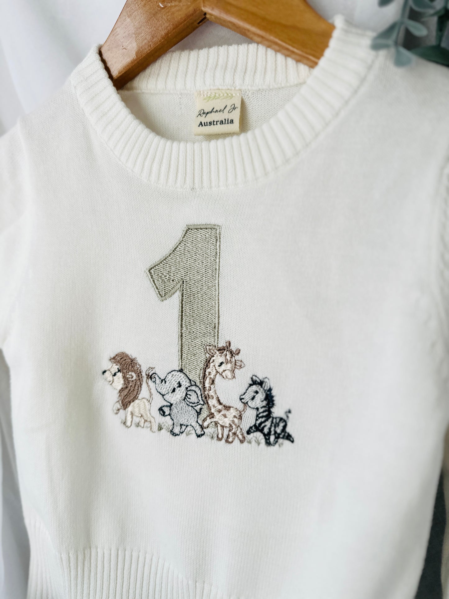 Birthday outfit with cotton onesie and embroidered jumper and linen pants