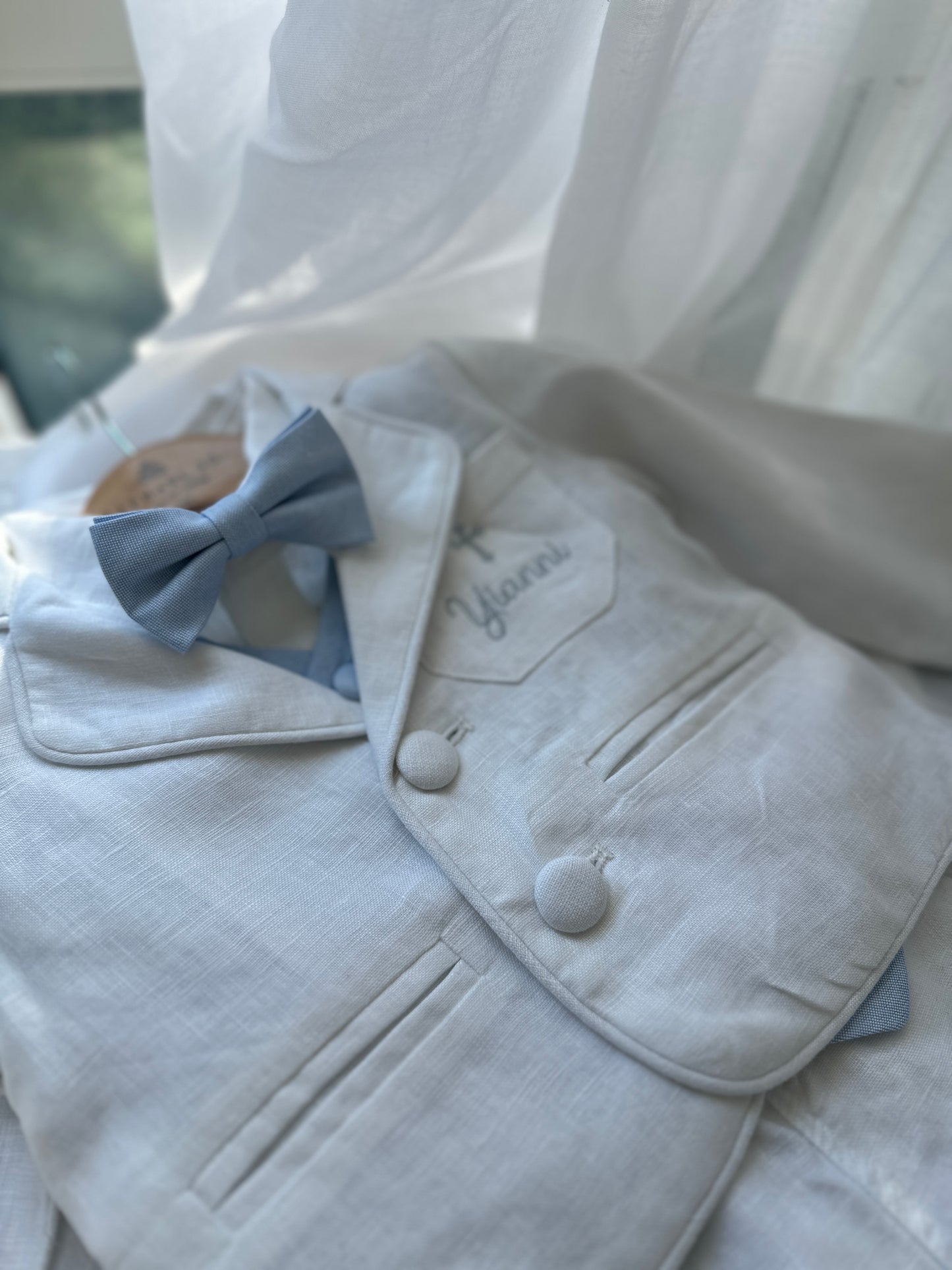 Boys pale blue shorts with linen shirt, blue suspenders and bow tie outfit plus optional extras