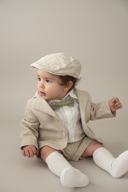 Beige Linen outfit with suspender shorts, shirt, and bow tie plus optional jacket and embroidery