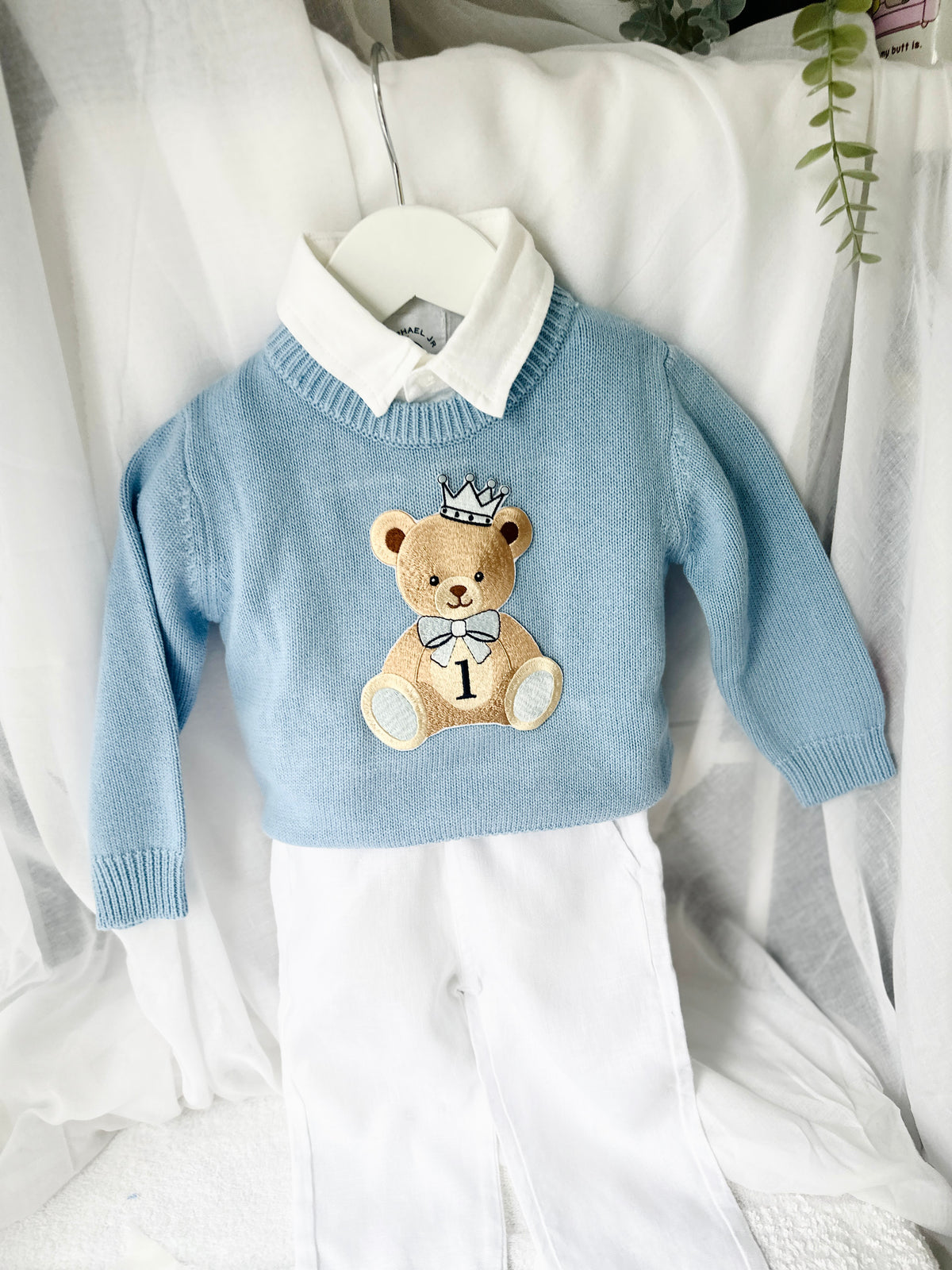 Pale blue teddy or hot air balloon jumper knit