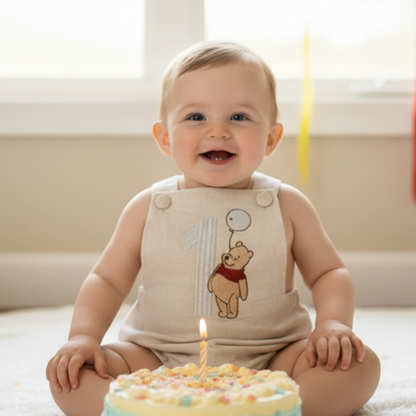 Boys Beige Linen First Birthday romper Pooh Bear and other designs