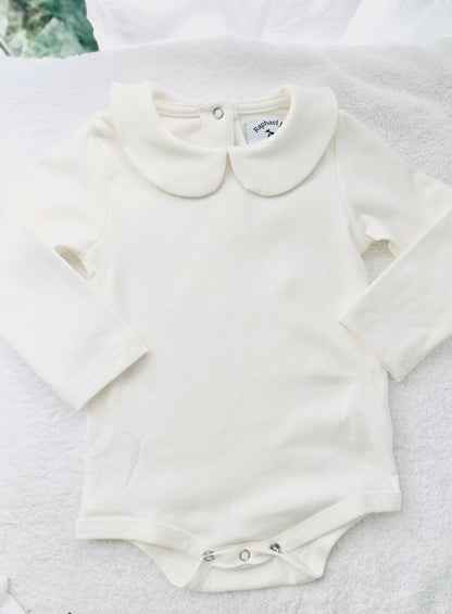 Baptism outfit with cotton onesie and cardigan or jumper and beige linen bloomers and white socks