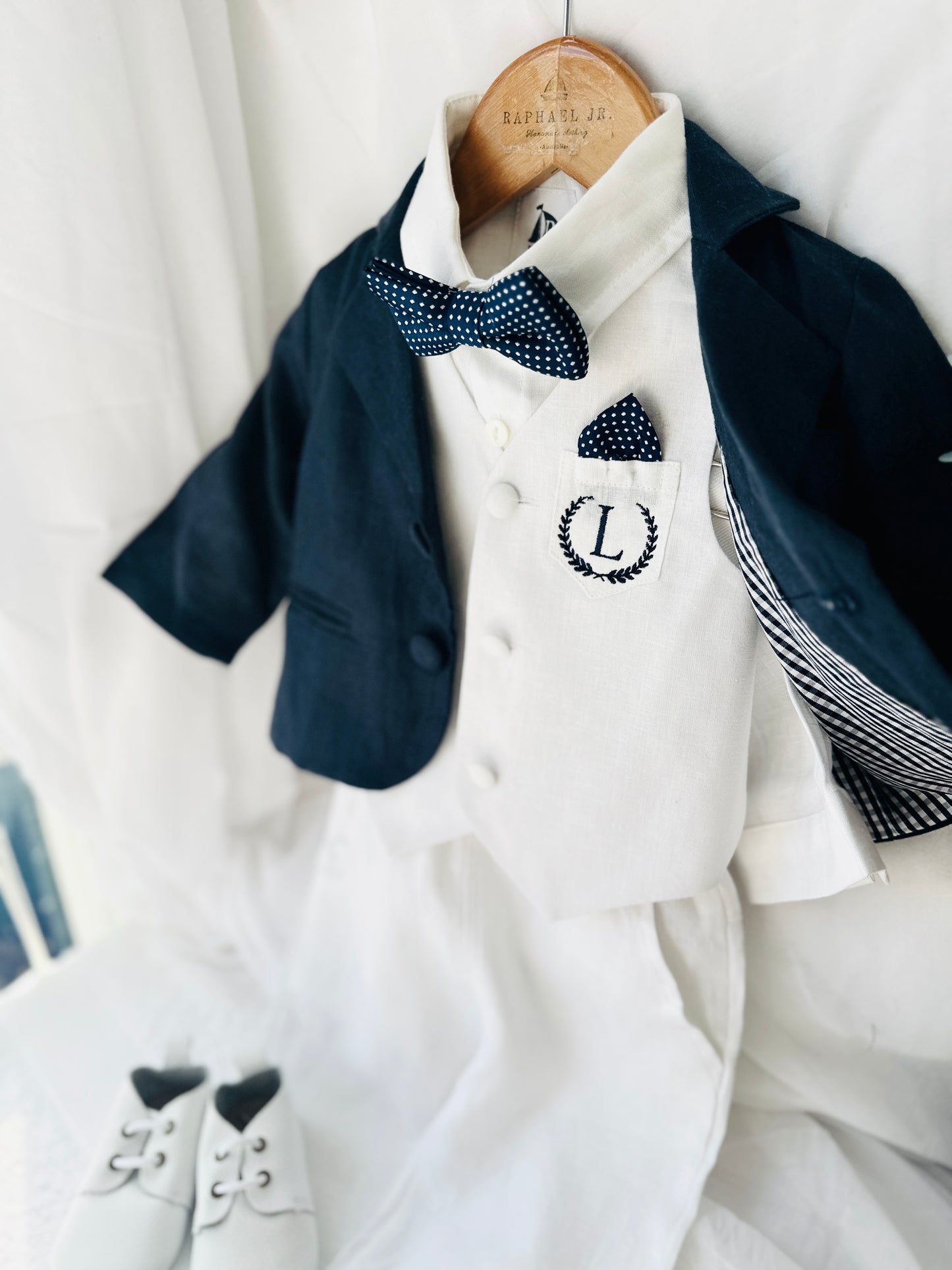 Boys white vest with white linen suit and navy jacket set