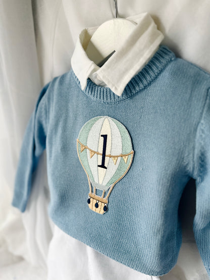 Pale blue teddy or hot air balloon jumper knit