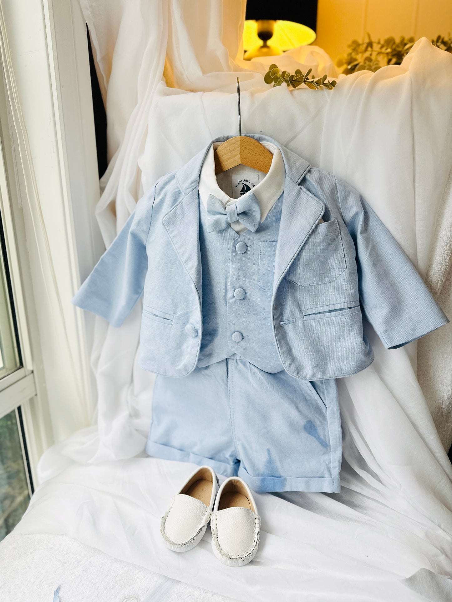 Pale blue summer vest set with blue vest, suspender shorts white shirt and blue blazer