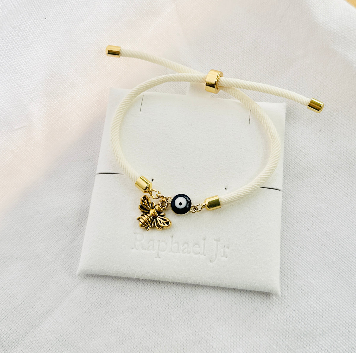 Evil eye bracelet white rope with gold clasps and optional charm