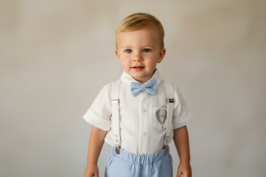 Blue chambray summer first birthday set with shorts, shirt, suspenders and bow tie plus optional extras