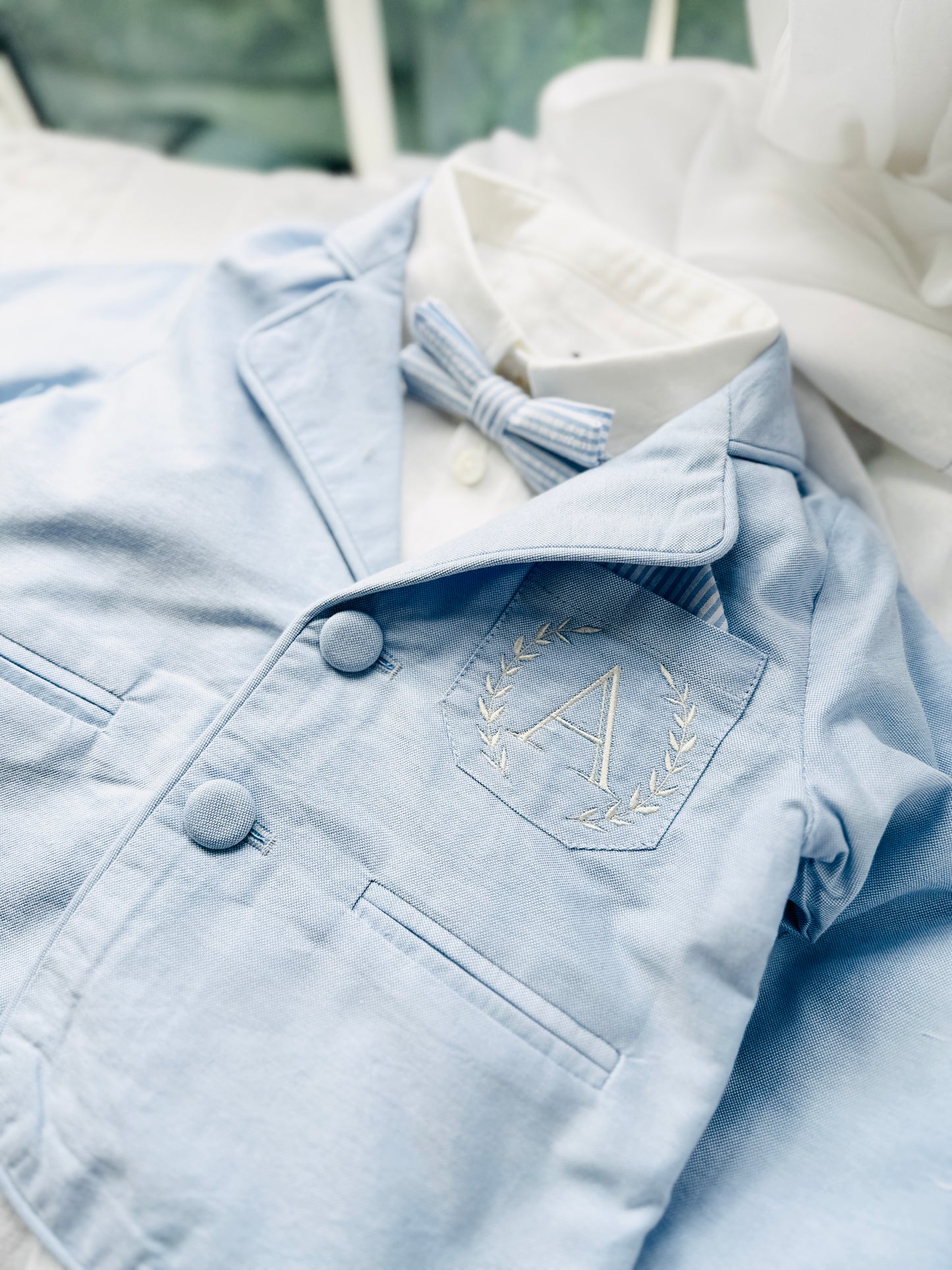Boys pale blue shorts with linen shirt, blue suspenders and bow tie outfit plus optional extras