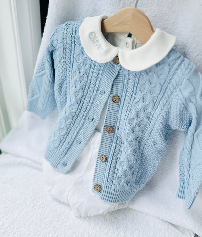 Baby outfit with blue cardigan, round collar bodysuit and white linen bloomers and long socks
