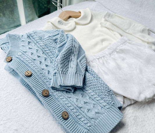 Baby outfit with blue cardigan, round collar bodysuit and white linen bloomers and long socks