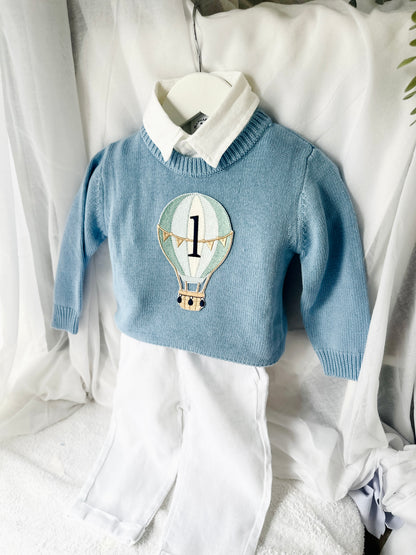 Pale blue teddy or hot air balloon jumper knit