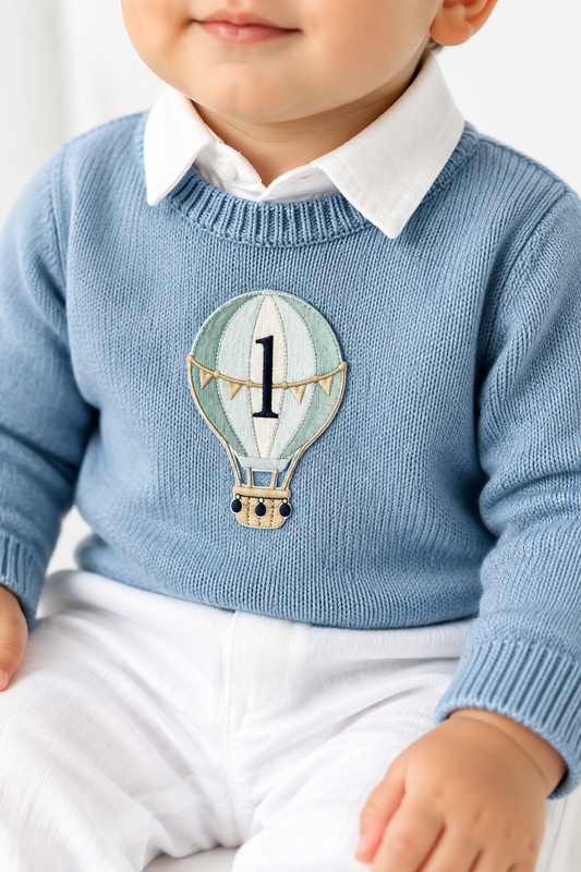 Pale blue teddy or hot air balloon jumper knit
