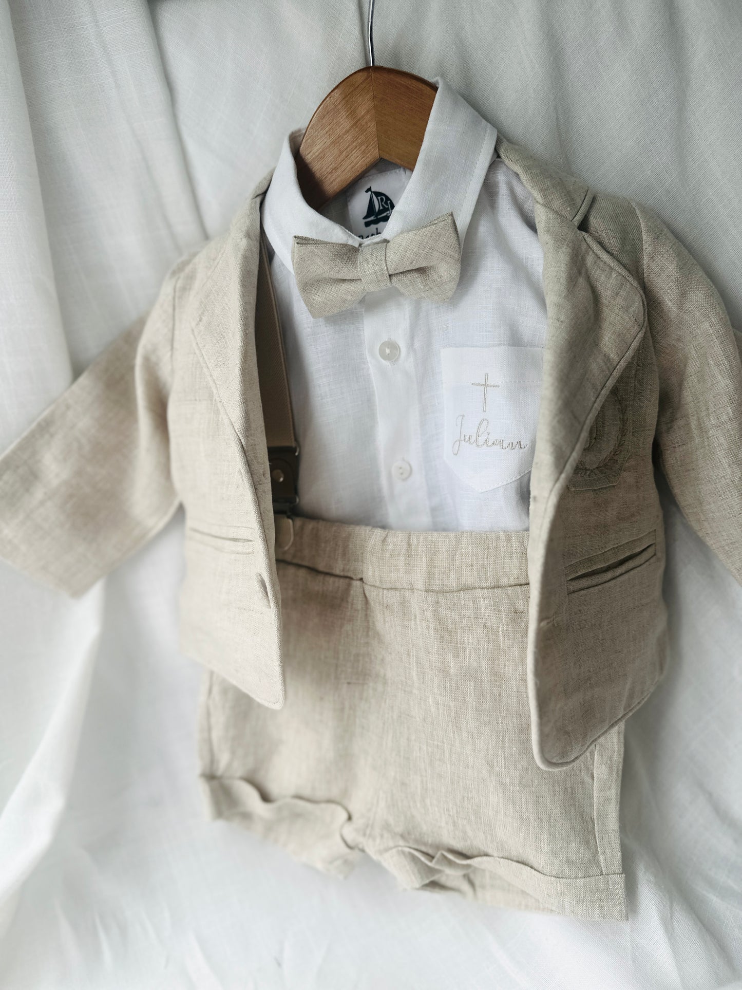 Beige Linen Baptism outfit with suspender shorts, shirt, and bow tie plus optional jacket and embroidery
