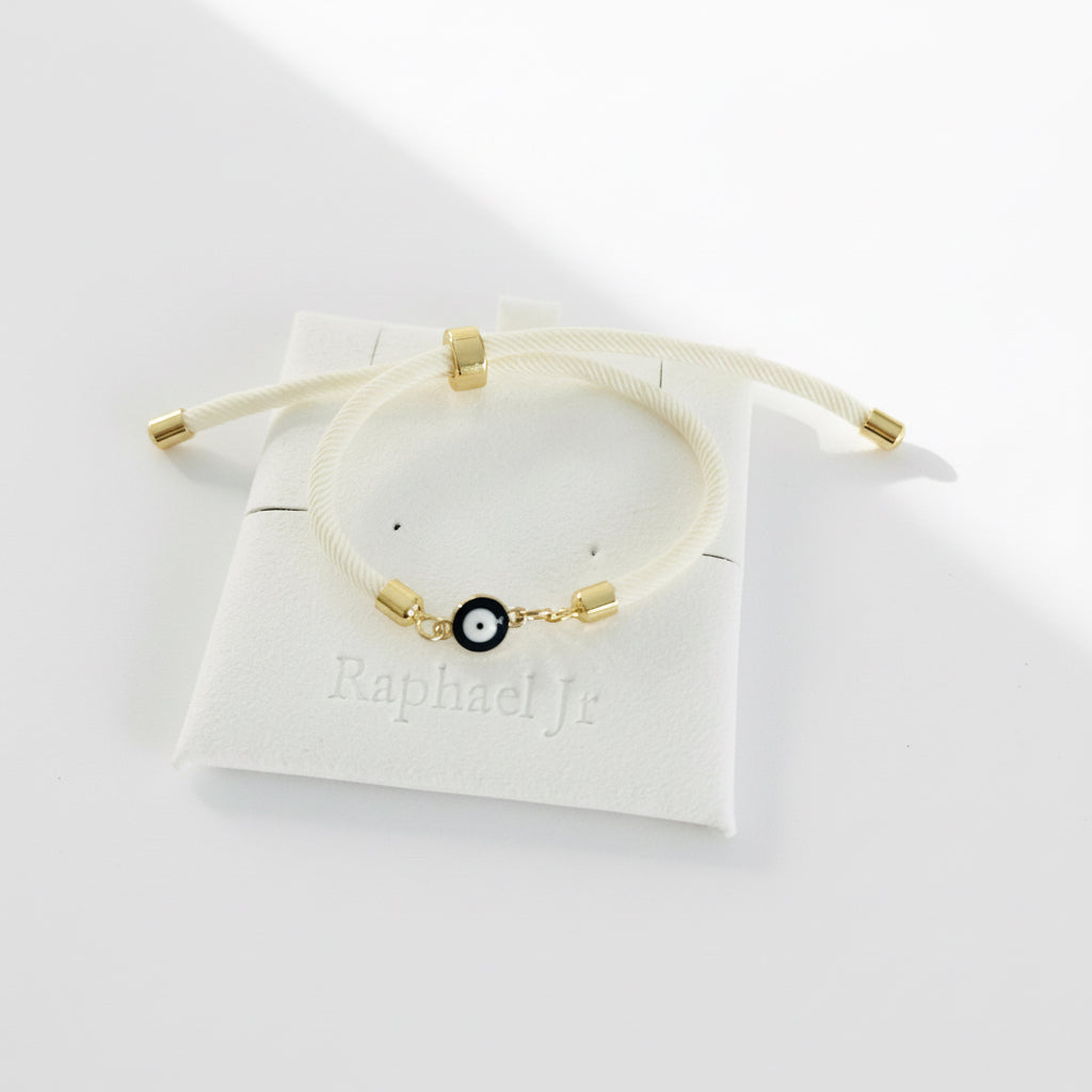 Evil eye bracelet white rope with gold clasps and optional charm