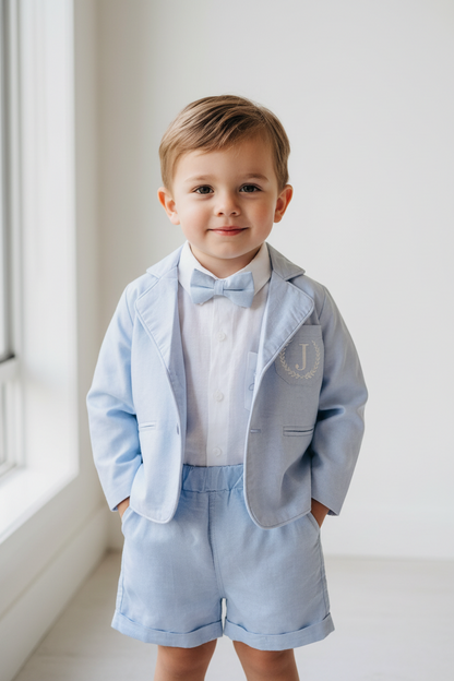 Pale blue summer vest set with blue vest, suspender shorts white shirt and bowtie