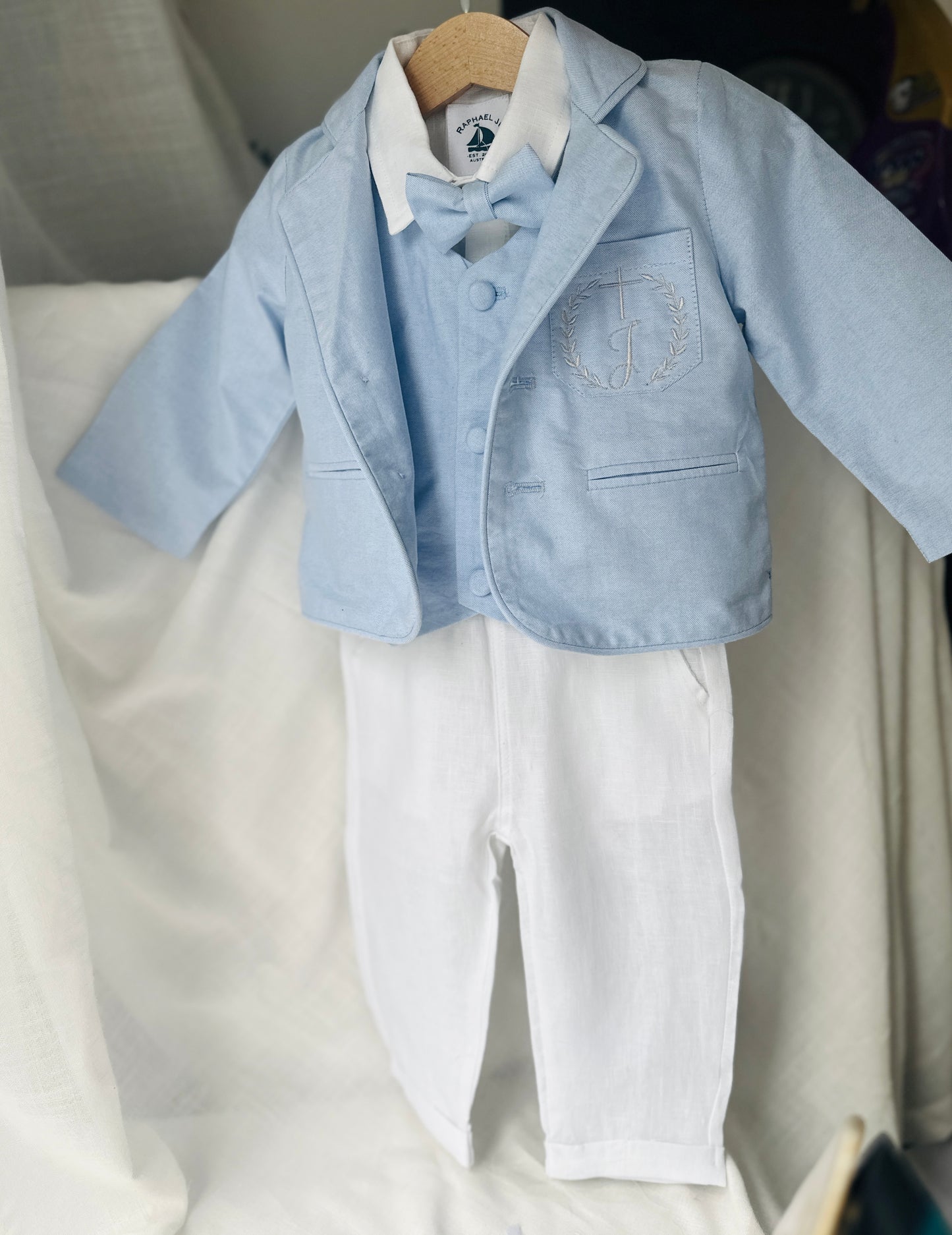 Boys pale blue and white Baptism outfit with blue vest, white linen suspender pants and shirt