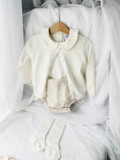 Baptism outfit with cotton onesie and cardigan or jumper and beige linen bloomers and white socks