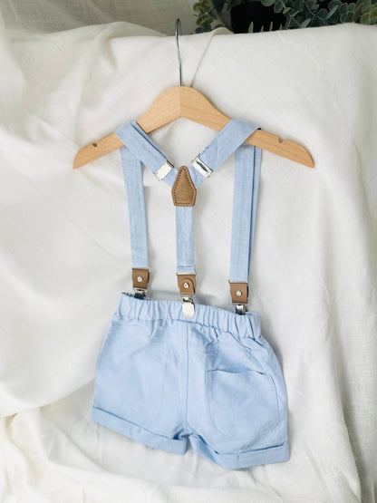 Boys pale blue shorts with linen shirt, blue suspenders and bow tie outfit plus optional extras