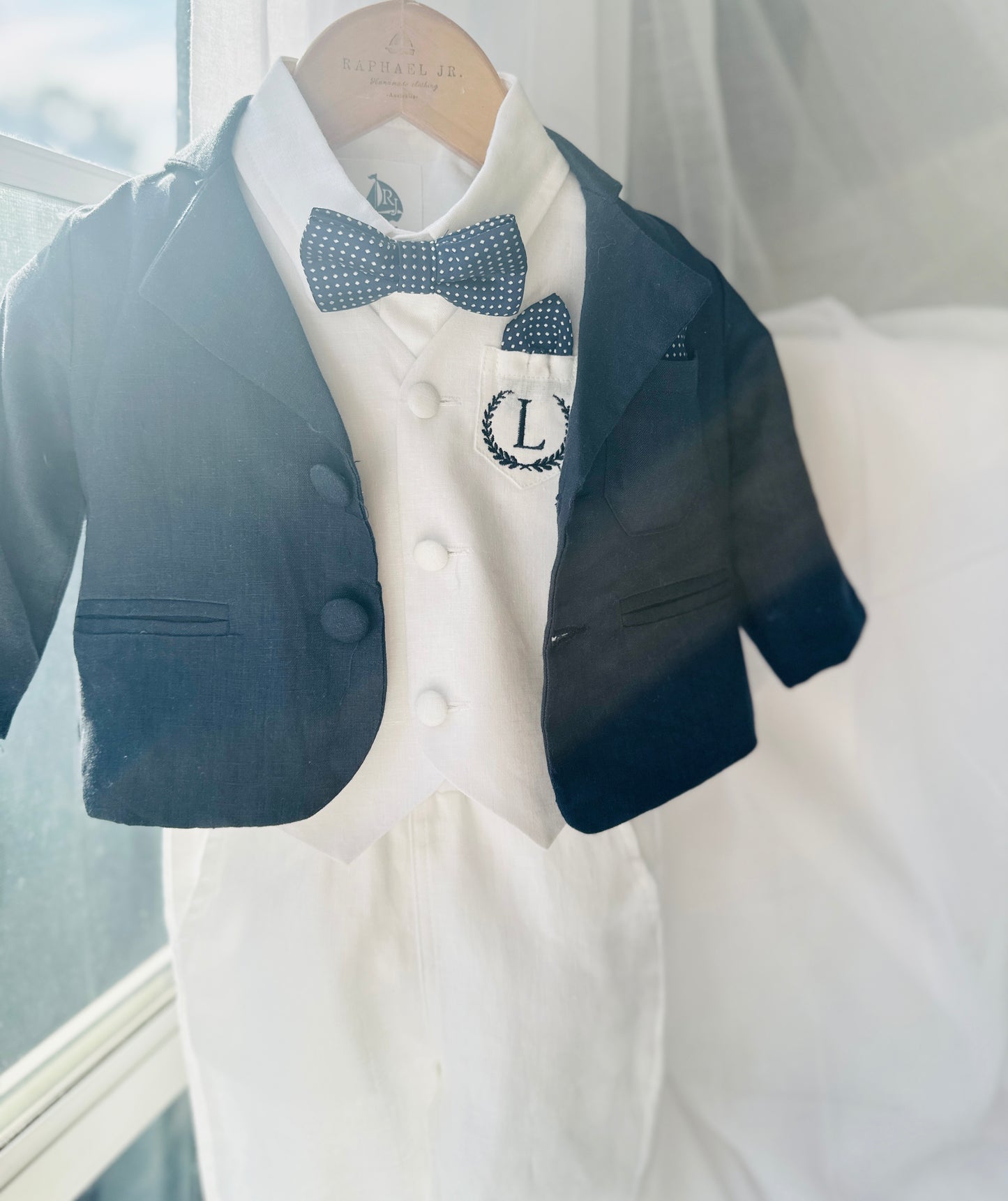 Boys white vest with white linen suit and navy jacket set